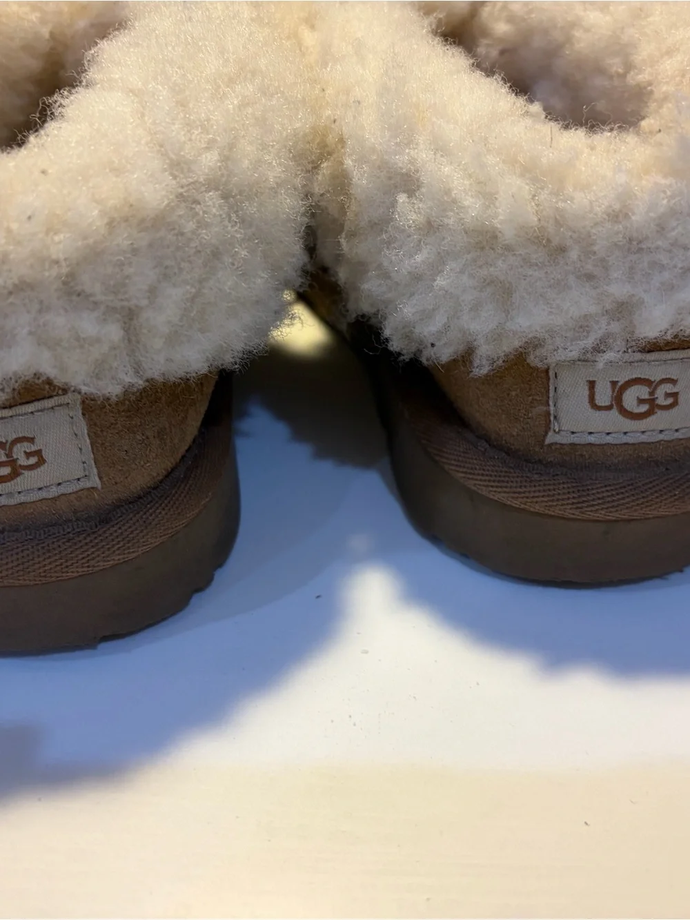 UGG Cream and Brown Shearling Slip-On with Label Detail